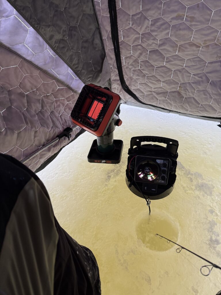 Heat Hog heater and early ice fishing equipment used in hard-edge locations for early ice walleye.